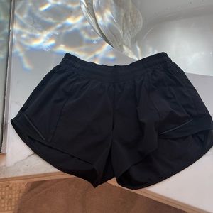 Black Lululemon low rise 4 inch inseam shorts size 10